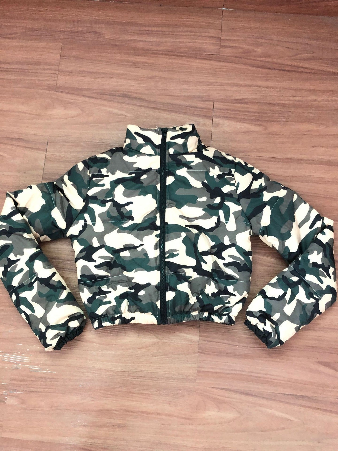 Green camouflage down jacket